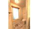Clean bathroom with marble shower and updated fixtures at 1185 Bayshore Dr, Englewood, FL 34223
