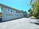 Contemporary home with four-car garage at 1185 Bayshore Dr, Englewood, FL 34223