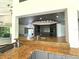 Kitchen features granite countertops and a breakfast bar with pool views at 1185 Bayshore Dr, Englewood, FL 34223