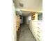 Large walk-in closet with ample shelving and drawers at 1185 Bayshore Dr, Englewood, FL 34223