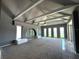 Spacious primary bedroom with water views and high ceilings at 1185 Bayshore Dr, Englewood, FL 34223