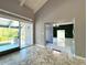 Bright and airy living area with access to patio at 1185 Bayshore Dr, Englewood, FL 34223