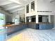 Modern kitchen with gray cabinetry, granite counters, and stainless steel appliances at 1185 Bayshore Dr, Englewood, FL 34223