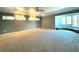 Spacious main bedroom with bay window and ceiling fan at 1185 Bayshore Dr, Englewood, FL 34223