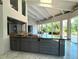 Spacious kitchen with large island and high-end appliances at 1185 Bayshore Dr, Englewood, FL 34223