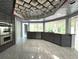 Modern kitchen with stainless steel appliances and marble flooring at 1185 Bayshore Dr, Englewood, FL 34223