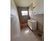 Bathroom with new vanity and tiled floors at 21098 Glendale Ave, Port Charlotte, FL 33952