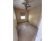 Bedroom with tile floors and a ceiling fan at 21098 Glendale Ave, Port Charlotte, FL 33952