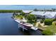 Private boat dock with lift and waterfront access at 1425 Pine Island Ct, Punta Gorda, FL 33950