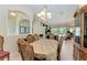 Spacious dining area with a view into the living room and pool area at 378 Monaco Dr, Punta Gorda, FL 33950