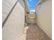 Charming courtyard with brick pavers and walls creating a cozy outdoor living space at 3800 Bal Harbor Blvd # 212, Punta Gorda, FL 33950