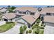 Beautiful two-story home with a tile roof, attached garage, landscaped yard, and screened-in patio at 3800 Bal Harbor Blvd # 212, Punta Gorda, FL 33950