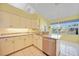 Bright kitchen featuring granite countertops, stainless steel appliances, and lots of natural light at 3800 Bal Harbor Blvd # 212, Punta Gorda, FL 33950