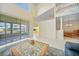 Bright and airy living room with vaulted ceilings and scenic views of the canal and lanai at 3800 Bal Harbor Blvd # 212, Punta Gorda, FL 33950