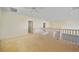 Spacious loft area featuring carpeted floor, ceiling fan, and natural light at 3800 Bal Harbor Blvd # 212, Punta Gorda, FL 33950