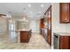 Island kitchen with granite countertops and custom cabinetry at 3439 Nighthawk Ct, Punta Gorda, FL 33950