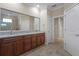 Double vanity bathroom with granite countertop and ample storage at 3439 Nighthawk Ct, Punta Gorda, FL 33950