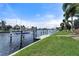 Private boat dock with lift and grassy area at 3439 Nighthawk Ct, Punta Gorda, FL 33950