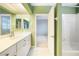 Well-appointed bathroom with double vanity and shower/tub combo at 3800 Bal Harbor Blvd # 212, Punta Gorda, FL 33950