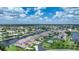 Wide aerial view of waterfront homes and community landscape at 3800 Bal Harbor Blvd # 212, Punta Gorda, FL 33950