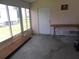 Florida room with large windows and table at 5787 Holiday Park Blvd, North Port, FL 34287