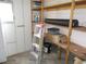 Storage area with shelves and ladder at 5787 Holiday Park Blvd, North Port, FL 34287