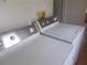 View of laundry room with washer and dryer included at 5787 Holiday Park Blvd, North Port, FL 34287