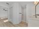 Clean bathroom with white vanity and shower at 4582 Enid Ln, North Port, FL 34288
