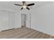 Bedroom with ceiling fan and access to another room at 4582 Enid Ln, North Port, FL 34288