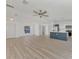 Open living area with kitchen and access to other rooms at 4582 Enid Ln, North Port, FL 34288