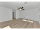 Spacious bedroom with wood floors and ceiling fan at 4582 Enid Ln, North Port, FL 34288