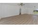 Spacious living room with light wood flooring at 4582 Enid Ln, North Port, FL 34288