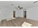 Bright and airy bedroom with wood floors and access to bathroom at 4582 Enid Ln, North Port, FL 34288