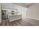 Modern kitchen with island and stainless steel appliances at 1019 Cazenovia St, Port Charlotte, FL 33952