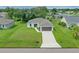 New construction home with a two-car garage and driveway at 1019 Cazenovia St, Port Charlotte, FL 33952