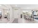 An inviting foyer leading to an open-concept dining and living area, with a conveniently located office space nearby at 16429 Bridle Ridge St, Port Charlotte, FL 33953