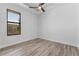 Bright bedroom with wood flooring and a view of pool at 24051 Pyramid Way, Punta Gorda, FL 33955
