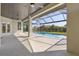 Covered lanai featuring a pool and views of the neighborhood at 24051 Pyramid Way, Punta Gorda, FL 33955