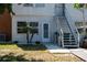Exterior shot featuring building stairs and beautiful landscaping surrounding the property at 4158 Tamiami Trl # U6, Port Charlotte, FL 33952