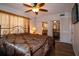 Bright bedroom with ceiling fan, mirrored closet doors and laminate flooring at 4158 Tamiami Trl # U6, Port Charlotte, FL 33952