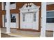 Brick building with white columns and entrance at 4158 Tamiami Trl # U6, Port Charlotte, FL 33952
