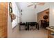 Home office space with desk, chair, and view to dining area at 4158 Tamiami Trl # U6, Port Charlotte, FL 33952