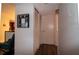 Hallway with double doors and wood-look flooring at 4158 Tamiami Trl # U6, Port Charlotte, FL 33952