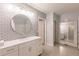 Main bathroom with subway tile and vanity at 27261 Guapore Dr, Punta Gorda, FL 33983