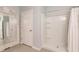 Bathroom with shower stall and decorative mirror at 27261 Guapore Dr, Punta Gorda, FL 33983