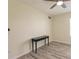 Simple bedroom with double doors and a small console table at 27261 Guapore Dr, Punta Gorda, FL 33983
