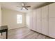 Bedroom with white built-in cabinets and vinyl flooring at 27261 Guapore Dr, Punta Gorda, FL 33983
