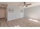 Spacious bedroom with light walls and ceiling fan at 27261 Guapore Dr, Punta Gorda, FL 33983