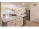 Open concept kitchen with island, stainless steel appliances, and dining area at 27261 Guapore Dr, Punta Gorda, FL 33983