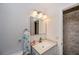 Cozy bathroom featuring a vanity and a towel rack at 2256 Auburn Blvd, Port Charlotte, FL 33948
